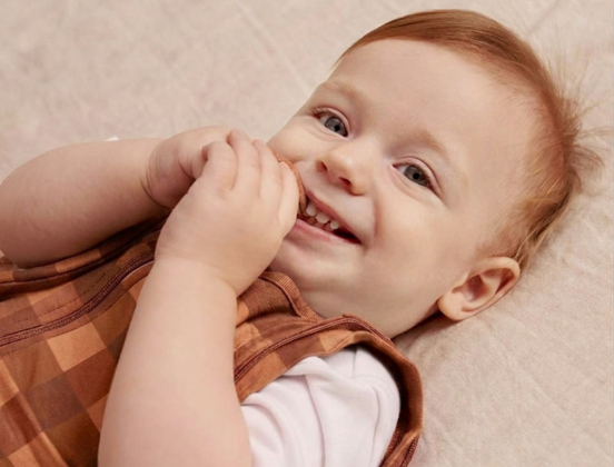 When to stop swaddling your baby